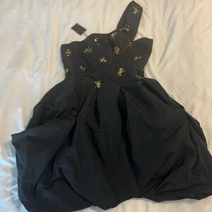 BCBGMaxAzria Black Dress with Elegant Detailing